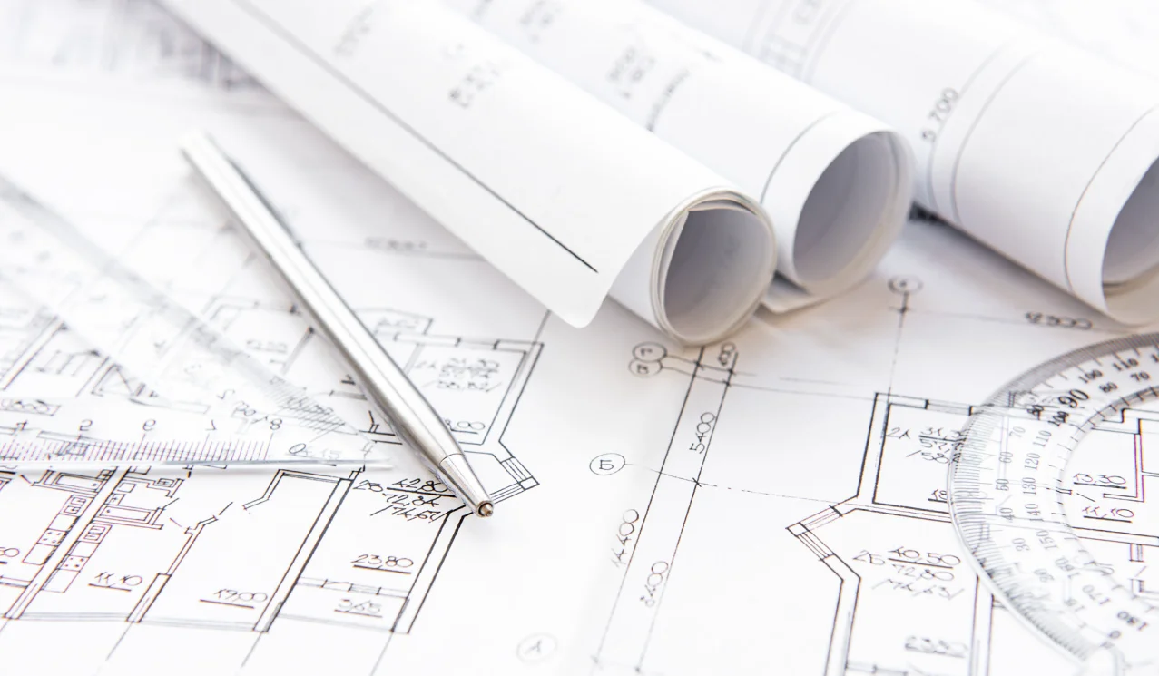 Construction blueprints illustrating drawing version control and engineering document management
