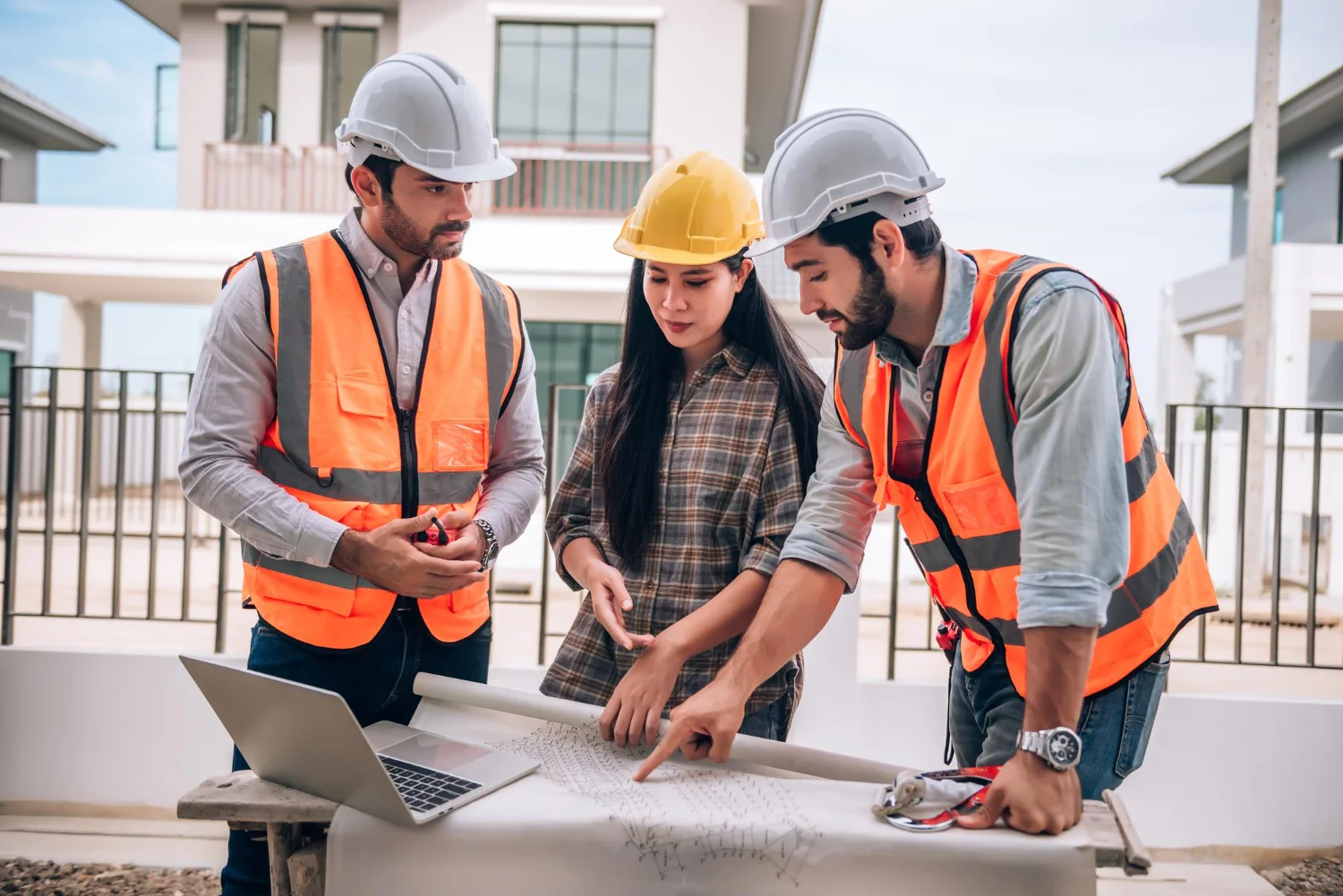 Construction team discussing who owns the answer to an open RFI on site